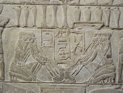 A detail of a relief in the tomb of Mereruka which depicts metalworkers and dwarfs employed in the manufacture of jewellery