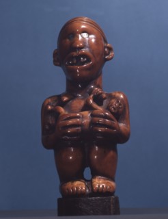 Ivory staff or sceptre finial, a prestige carving for royal or chiefly use, depicting a matrilineal ancestor