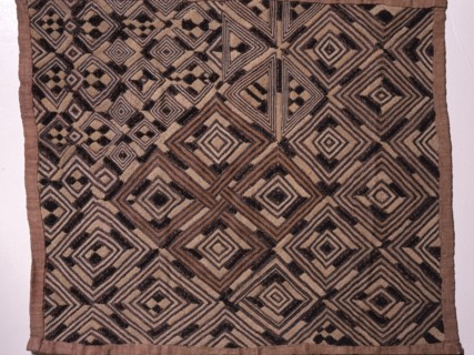 These raffia dance skirts were woven in pieces by men using upright single heddle looms, then sewn together and embroidered using a cut pile technique by women
