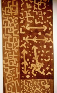 These raffia dance skirts were woven in pieces by men using upright single heddle looms, then sewn together, beaten, and appliqued by women