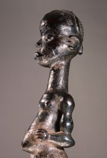 A standing figure with scarification design which was used in the Chibola cult