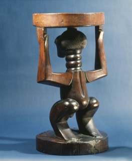 Stool supported by a male figure, served as an emblem of status and prestige for Songye chiefs