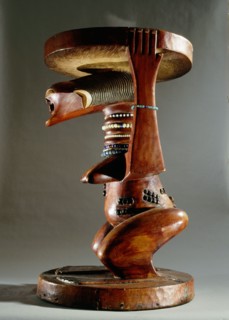 Stool supported by a female figure, served as an emblem of status and prestige for Songye chiefs