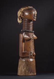 Minkishi, Songye power figure obtained from a doctor/diviner and used by its owner to heal, to promote fertility or to attack enemies using attached medicines wrapped around the base