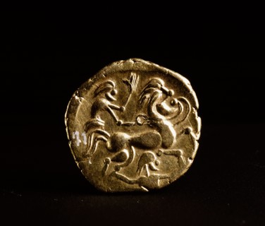 Coin showing a horse and rider