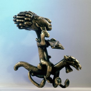 A brass weight for weighing gold dust in the form of a horse and rider