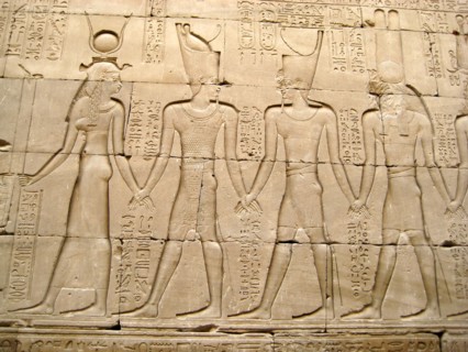 Reliefs on the outer back walls of the temple complex depicting a procession of gods and goddesses holding hands
