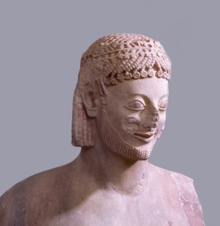 Detail of a sculpture showing the head of a horseman