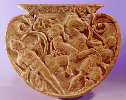 Hellenistic ivory sword chape (the end of a scabbard) showing a battle between Greeks and Amazons