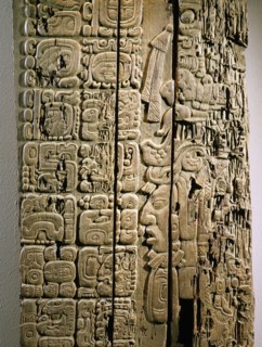 Detail of a carved wood lintel from Temple IV at Tikal, collected in 1877 by the explorer Gustav Bernoulli