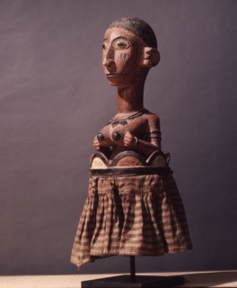 A figure probably from an altar which promotes the fertility ofwomen and crops