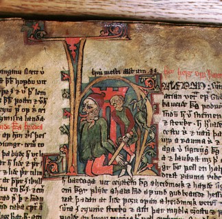 Illumination from the Icelandic manuscript Flateyjarbok which showsKing Harold Fine Hair cutting the fetters from the giant Dofri who was to become his foster father in folklore