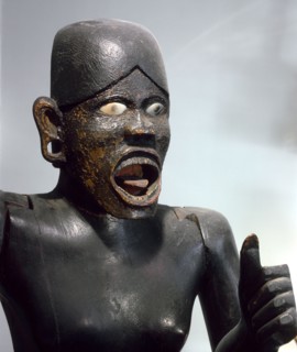 A life size guardian figure   possibly from a graveyard   meant to ward off evil spirits