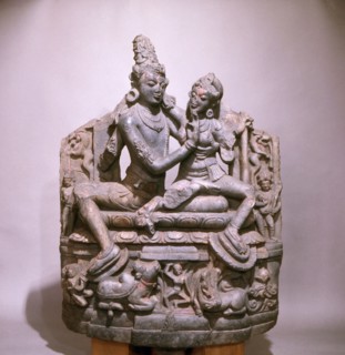 A sculpture of Shiva and Parvati