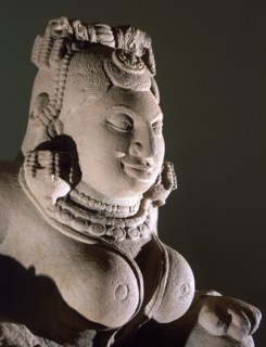 Early example of free standing stone sculpture of a creation goddess