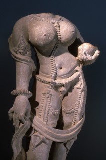 Statue of a voluptuous female deity, standing in tribhanga, the three bend pose which suggests a sensuous  liveliness and maternal energy