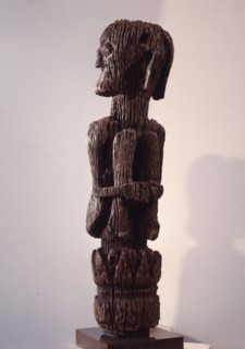 A male figure rising from a tree