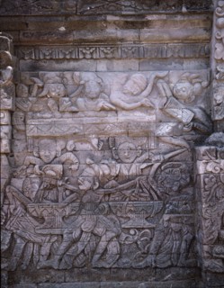 Stone relief on a temple wall at Sangsit, Buleleng