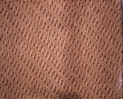 A batik kain with a variant of the scrolled parang motif once restricted to royal use