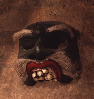 A mask, representing a diseased or deformed person, used in wayang wong performances of the Hindu epics, especially the Ramayana