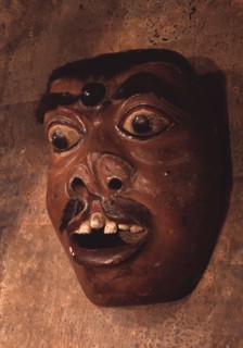A mask, representing a diseased or deformed person, used in wayang wong performances of the Hindu epics, especially the Ramayana