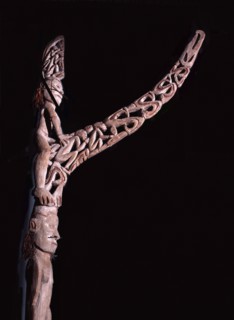 Phallic figures surmounting Asmat pole sculptures known as bis poles
