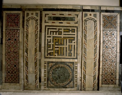 Mosaic panel with an inscription in the central square written in the interlocking script known as puzzle Kufic