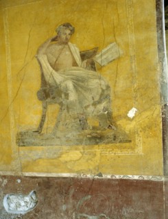 Fresco painting of a man reading