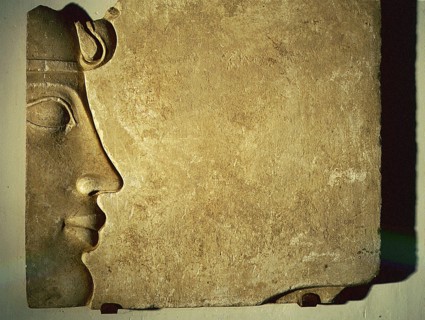 Fragment of a relief showing the profile of an Egyptian king wearing the uraeus