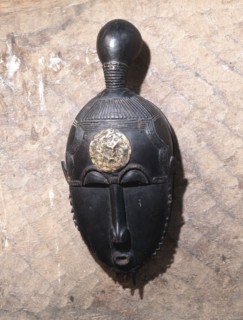 Kpan mask, one of a pair representing the senior female masqueraders in a four part performance called Goli