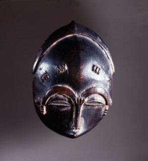 Miniature Baule mask, probably carried as a prestige object by a carver or the owner of a full sized mask
