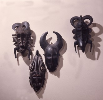 A selection of masks of the Kpelie type used in funerals and other ceremonies of the mens Poro society