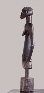 A fine example of a deble, or rhythm pounder, used to beat time for dances held in the sacred grove of the mens society in ceremonies such as funerals