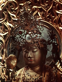 Amida Buddha with glass eyes and crystal mark on the forehead