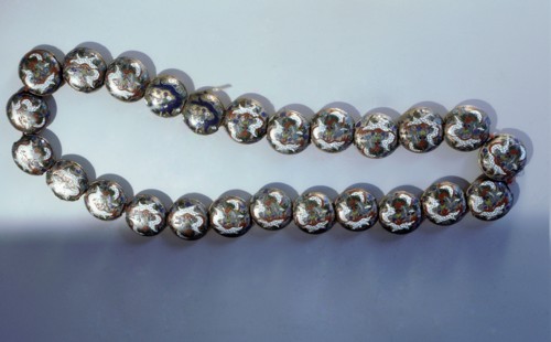 Necklace with enamelled beads