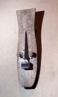 Little is known about the use of these rare masks, although they are believed to be associated with warfare