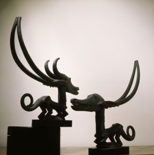 Chi Wara, depict a mythical hero combining aspects of man and antelope who taught men to till the fields