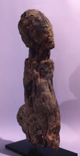 A root carving possibly representing a rider