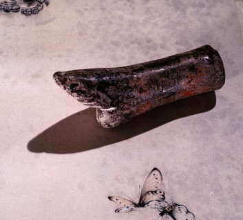 A model of a lily foot, possibly used as a teaching model for the process of binding girls feet with the aim of creating the tiny feet which were considered to be beautiful and erotic