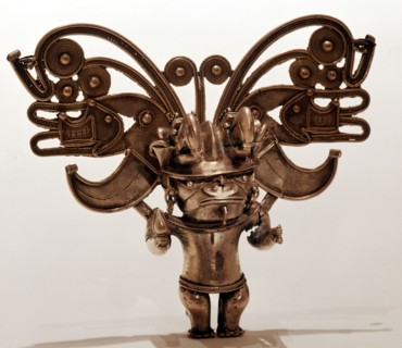 Figure pendant depicting possibly of a nobleman or chief with elaborate headdress known as cacique