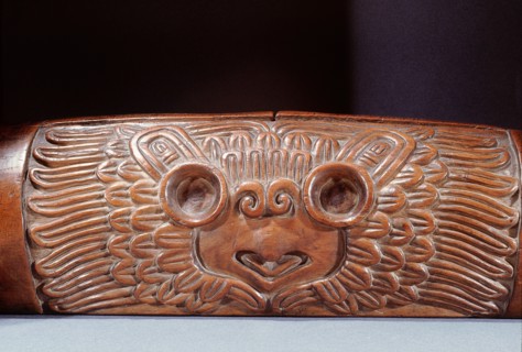 A teponaztli or two toned drum with a horned owl carved on the side