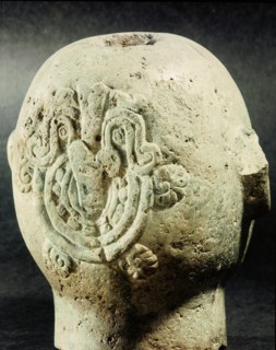 Head of Xipe Totec, the Flayed Lord, dressed in the skin of a sacrificial victim