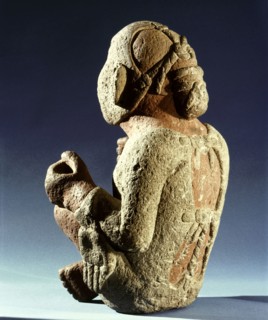 Xipe Totec, the Flayed Lord, dressed in the skin of a sacrificial victim