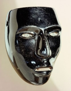 Miniature mask thought to represent Huitzilopochtlis lieutenant, Ixtilton