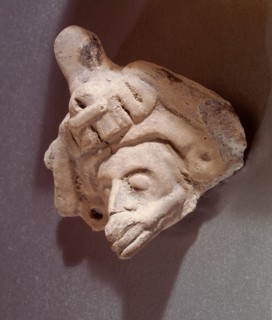 Small pottery idol which would have been kept in an Aztec home
