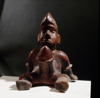 Seated ithyphallic figure