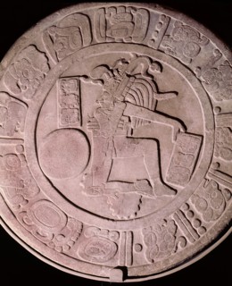Disc with relief design representing a ball player