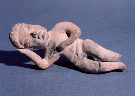 Figure of a woman lying down