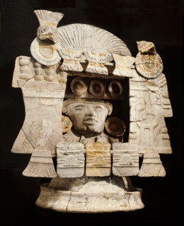 Brazier with a model of a temple and a mask of a god in the interior