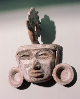 A ritual mask or possibly part of an incense burner